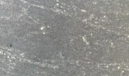 Closeup image of Virginia Black Honed Black Granite countertop slab
