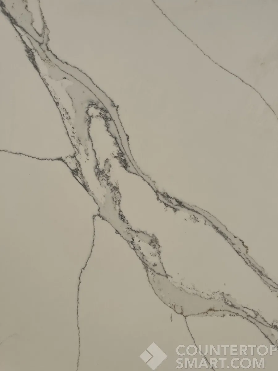 Closeup image of Compac Unique Calacatta Macchia Quartz countertop slab