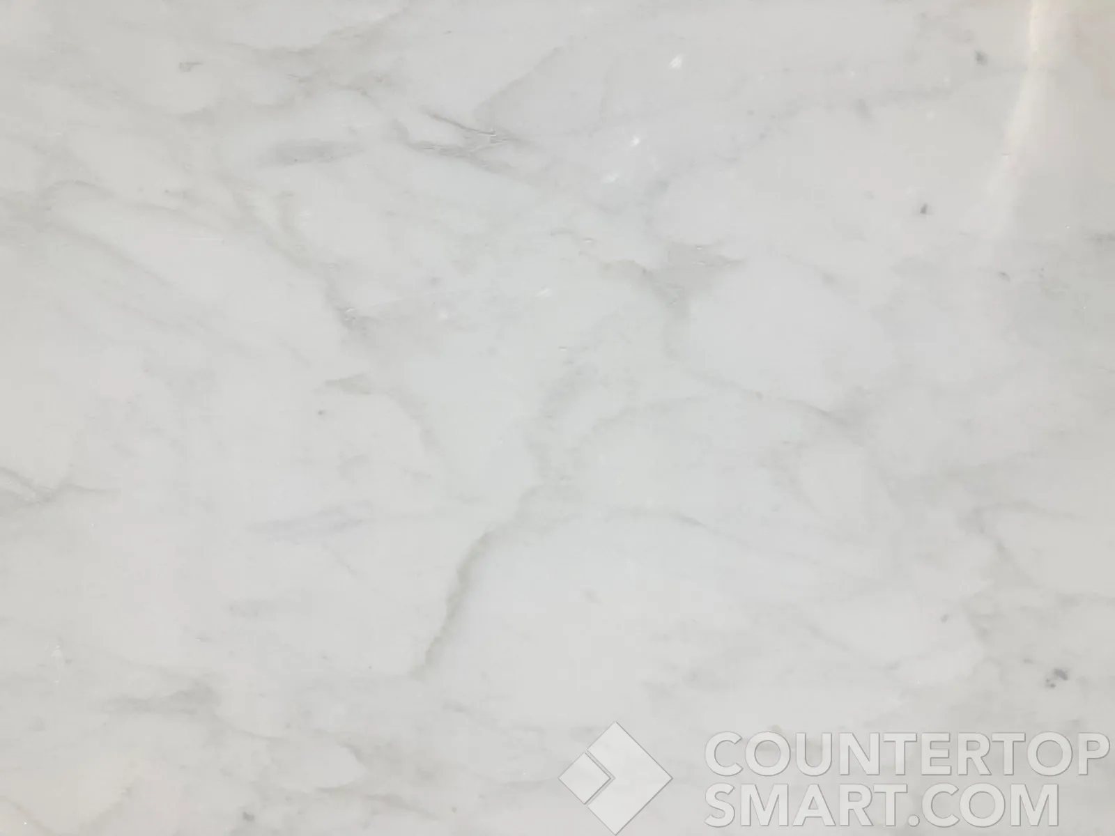 Closeup image of Calacatta Gold Marble countertop slab