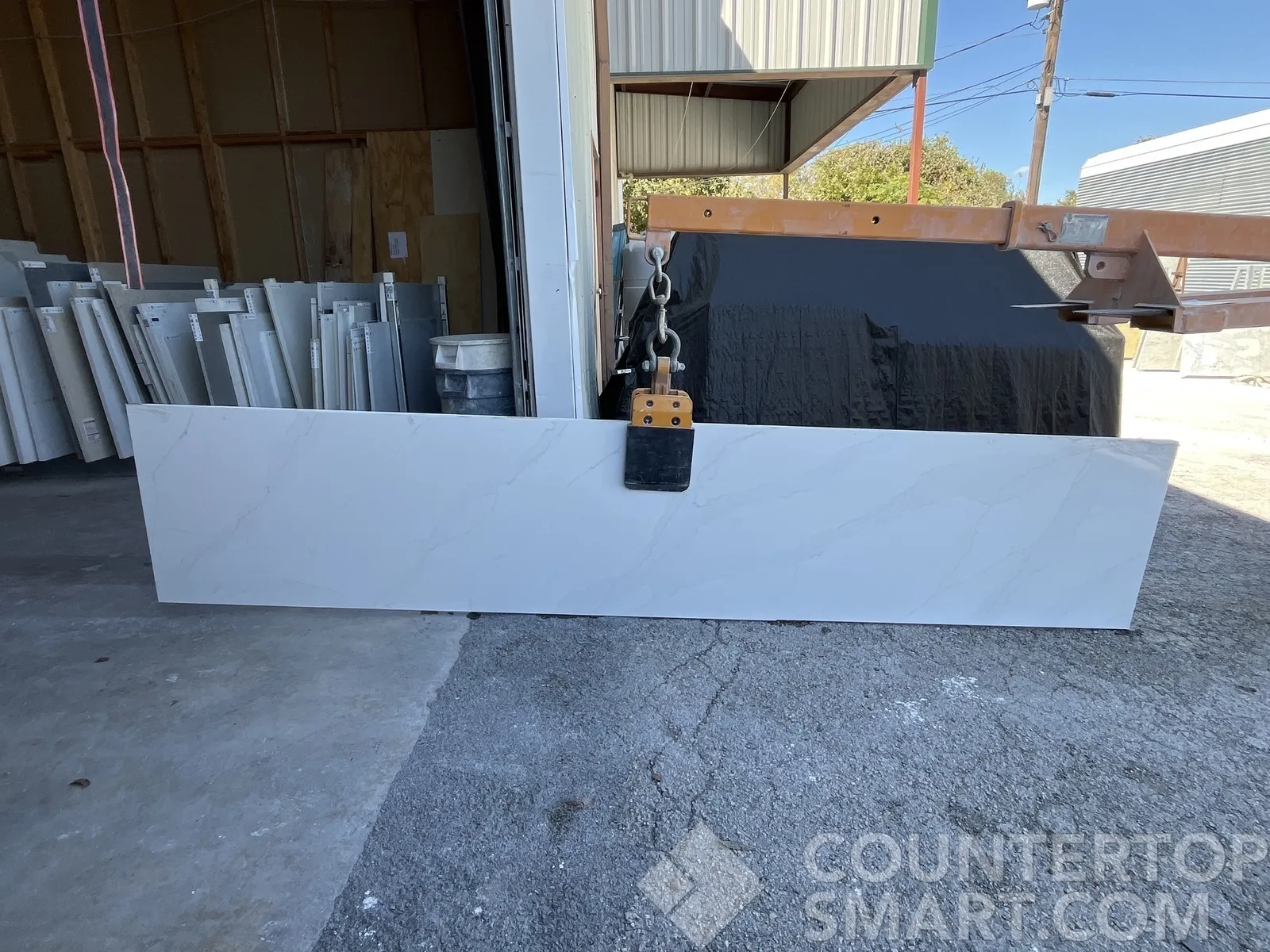 Full image of Q Quartz Calacatta Abezzo Quartz countertop slab