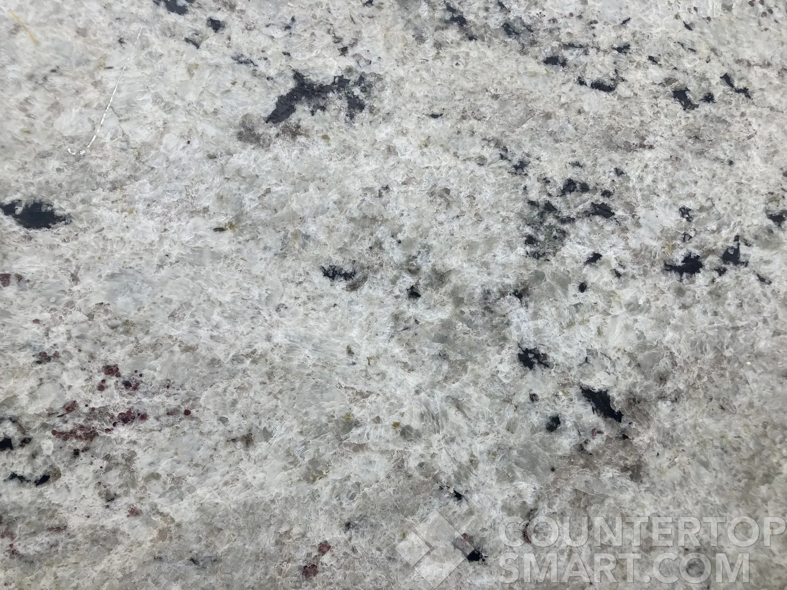 Closeup image of Absolute White Granite countertop slab