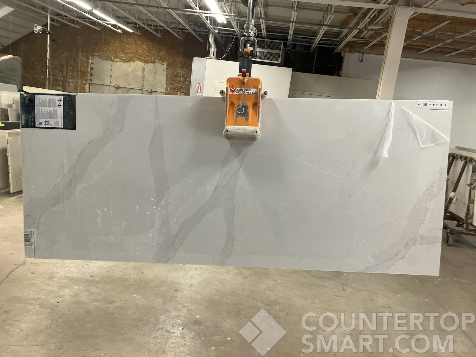 Full image of Silestone Eternal Calacatta Gold White Quartz countertop slab