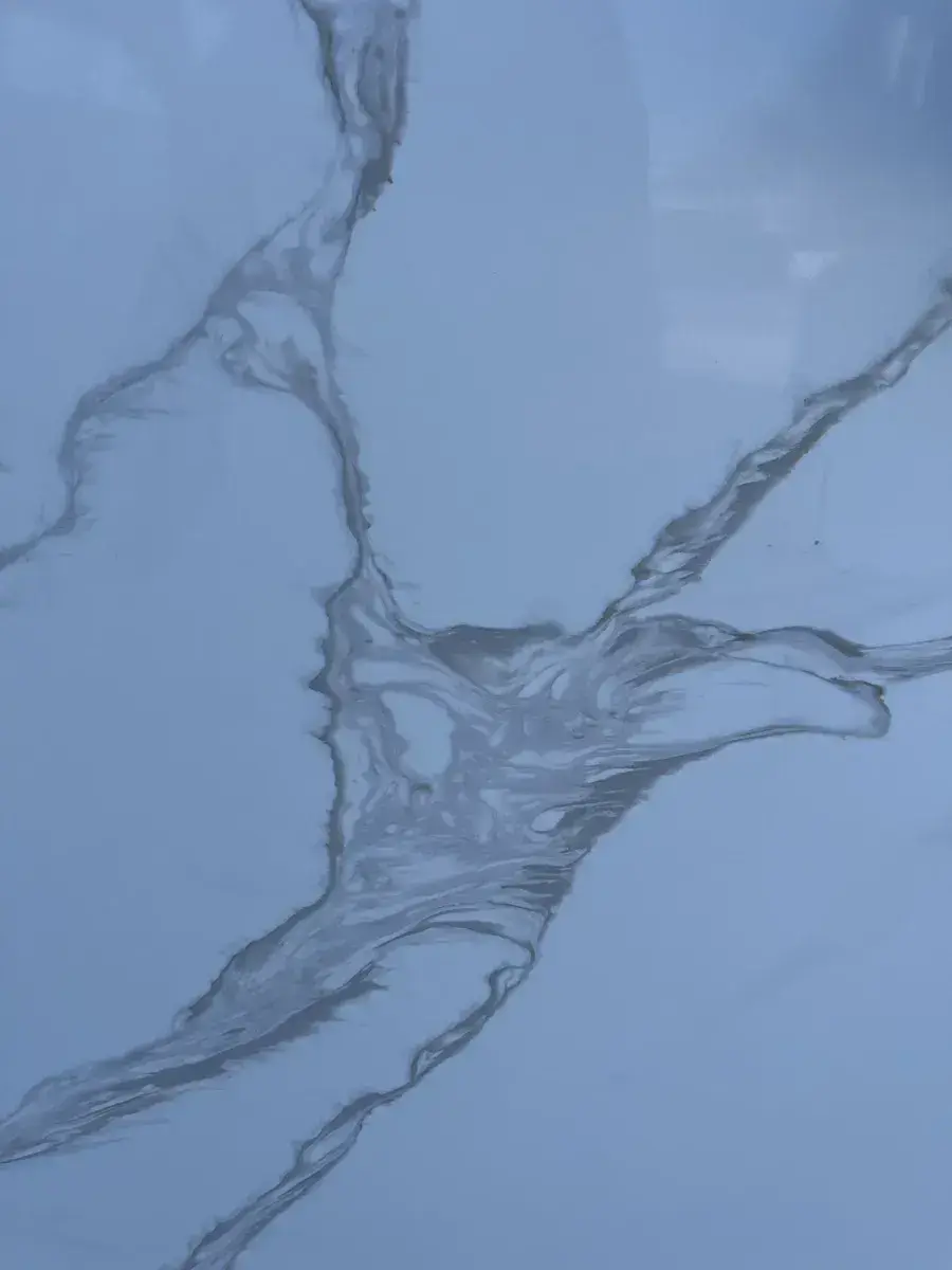 Closeup image of CRS Quartz Calacatta Prime White Quartz countertop slab