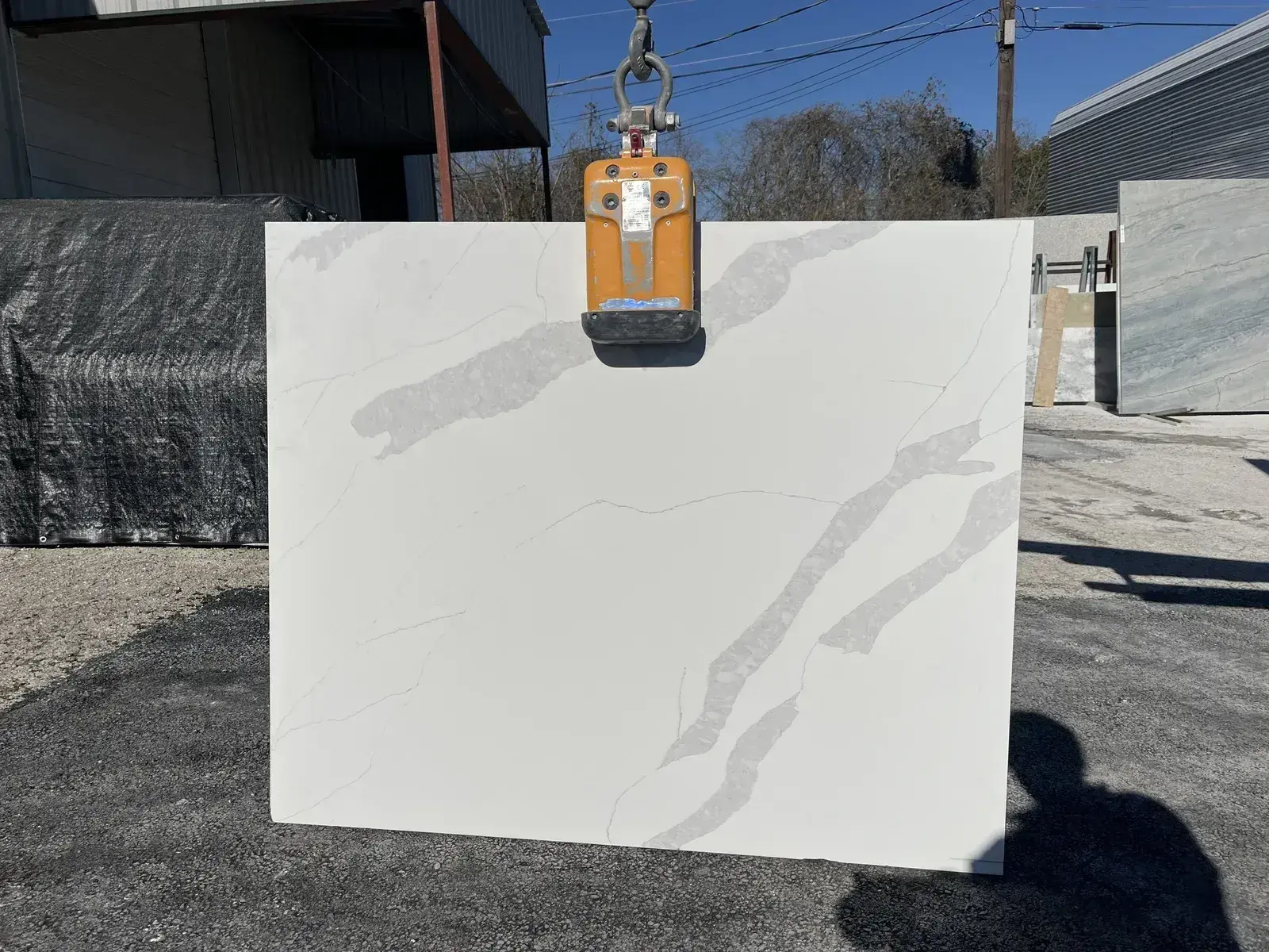 Full image of Q Quartz Calacatta Leon Quartz countertop slab