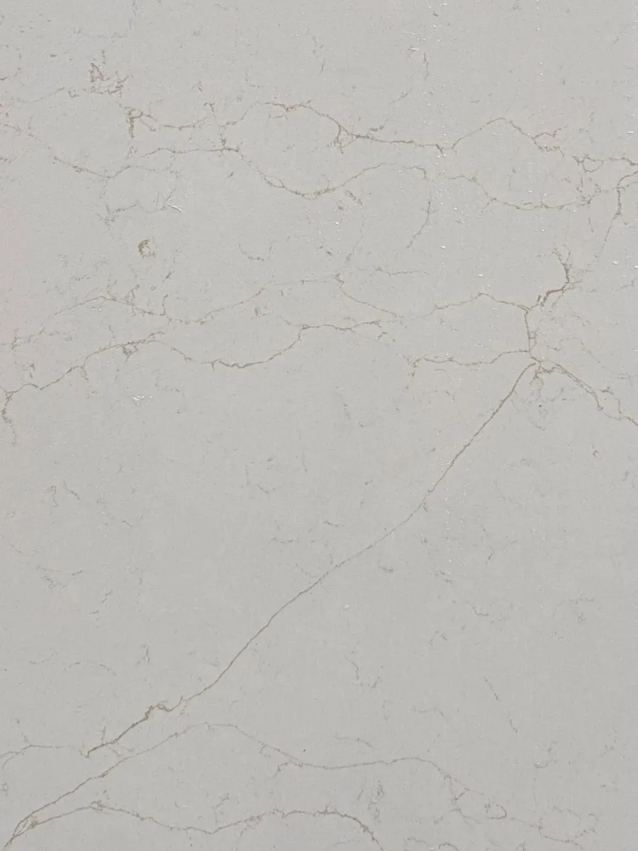 Closeup image of Daltile Valor Gold White Quartz countertop slab