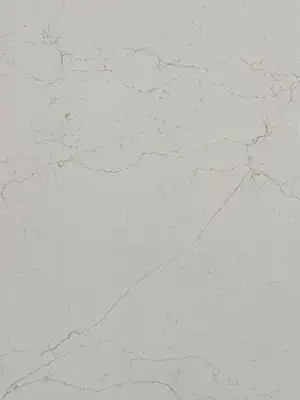 Closeup image of Daltile Valor Gold White Quartz countertop slab