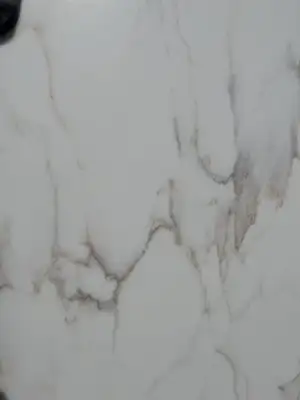 Closeup image of Q Quartz Calacatta Cinela White Quartz countertop slab