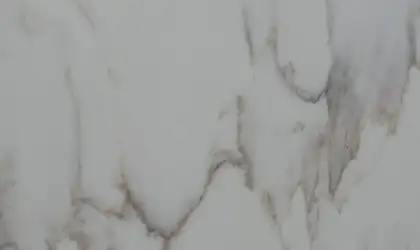 Closeup image of Q Quartz Calacatta Cinela White Quartz countertop slab