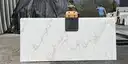 Full image of Q Quartz Calacatta Cinela White Quartz countertop slab