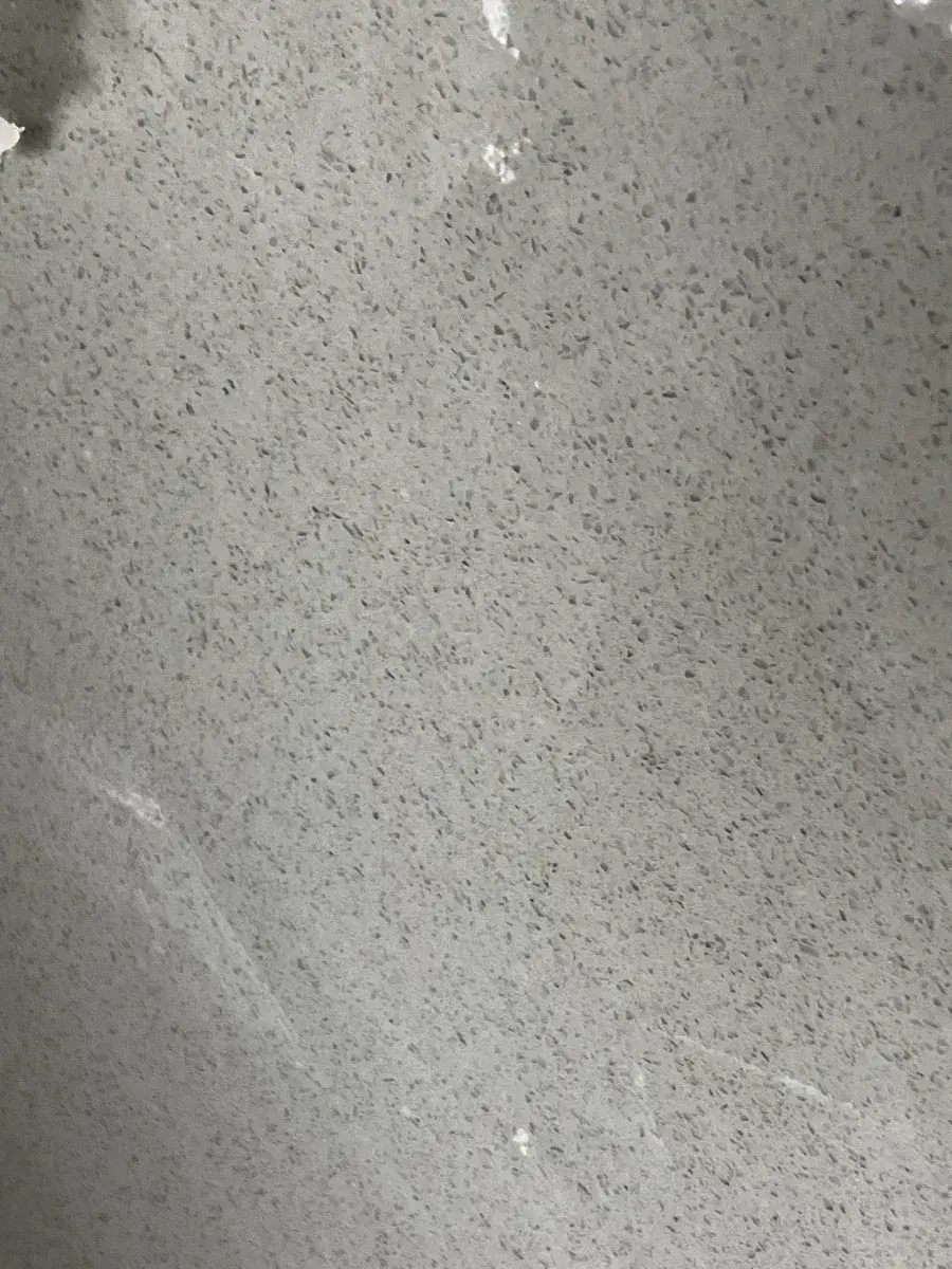 Closeup image of Q Quartz Grey Expo Grey Quartz countertop slab