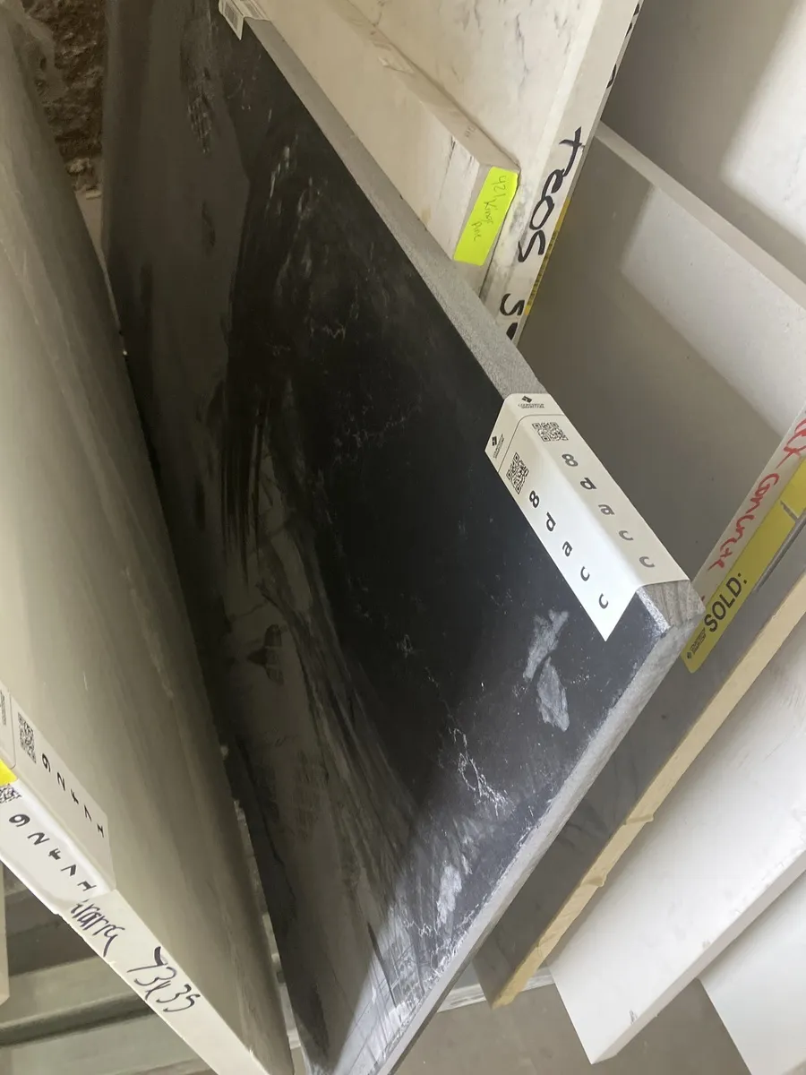 Full image of Daltile Liberty Black Black Quartz countertop slab