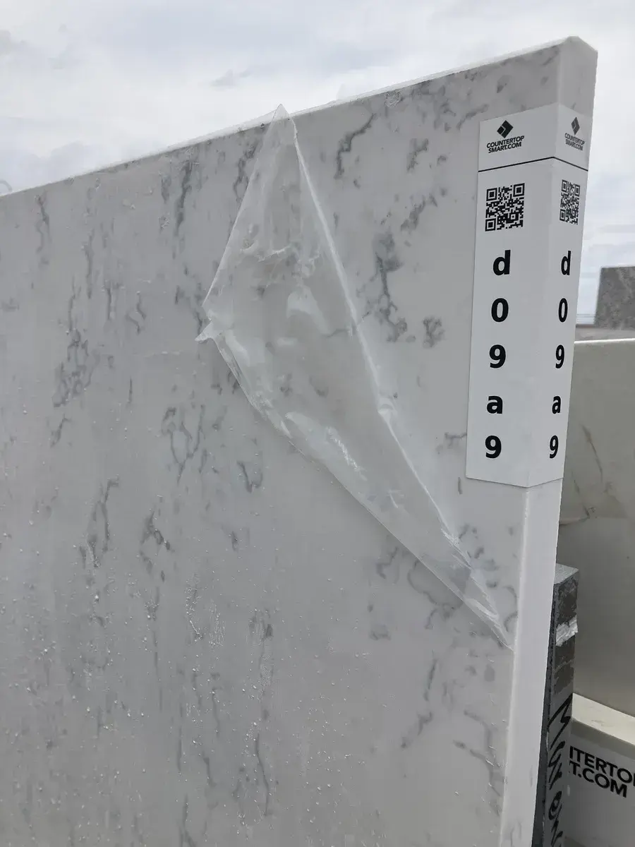 Full image of Q Quartz Carrara Lumos White Quartz countertop slab