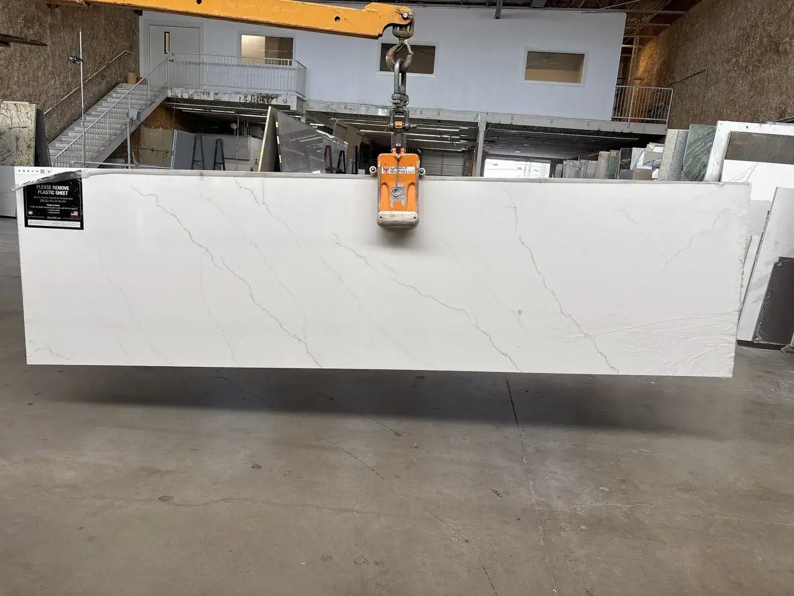 Full image of Q Quartz Calacatta Miraggio Quartz countertop slab