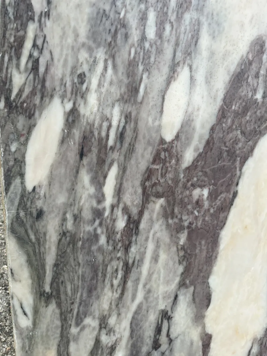 Closeup image of Breccia Viola Marble countertop slab