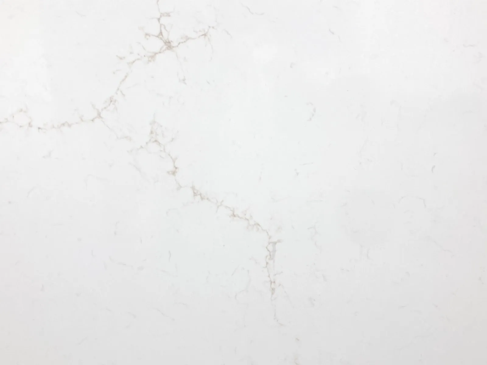 Closeup image of Stratus Quartz Magnifico Gold White Quartz countertop slab