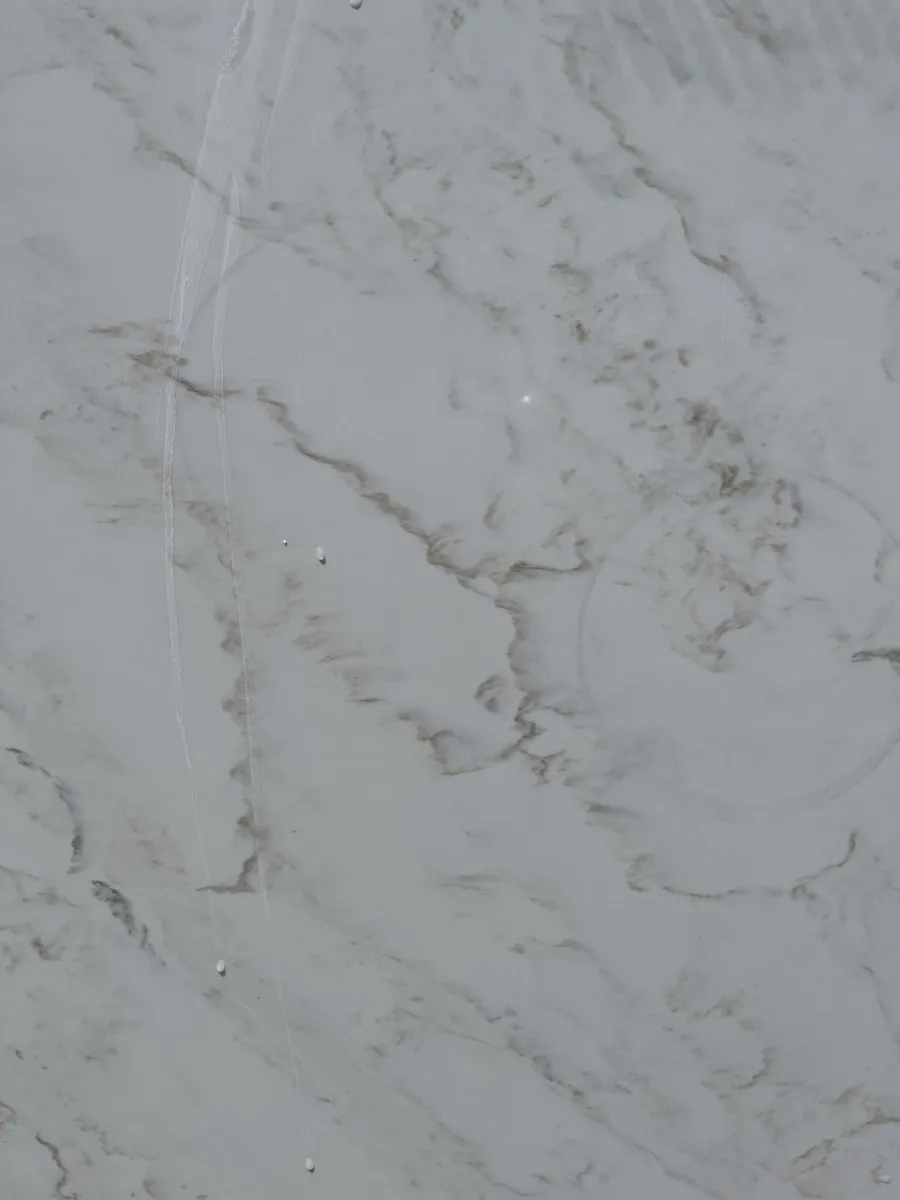 Closeup image of Q Quartz Calacatta Premata White Quartz countertop slab