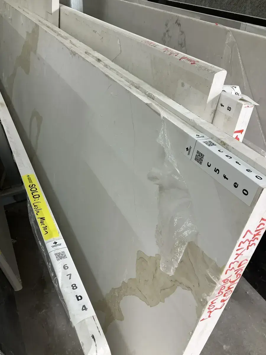 Full image of Q Quartz Calacatta Leon Gold Quartz countertop slab