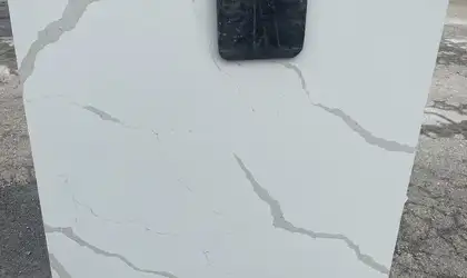 Closeup image of Della Terra Ripieno White Quartz countertop slab