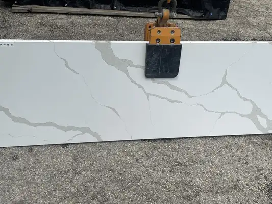 Closeup image of Della Terra Ripieno White Quartz countertop slab