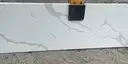 Closeup image of Della Terra Ripieno White Quartz countertop slab
