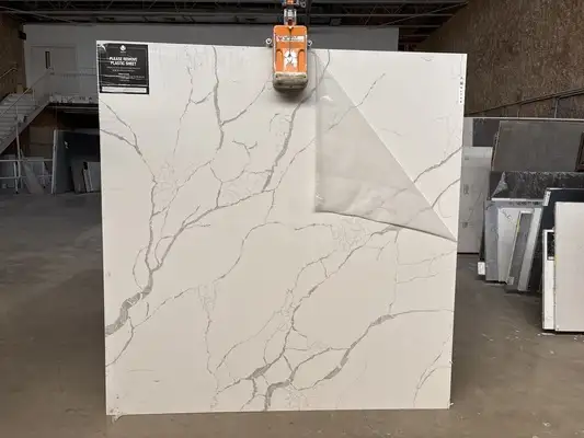Full image of Q Quartz Calacatta Laza Quartz countertop slab