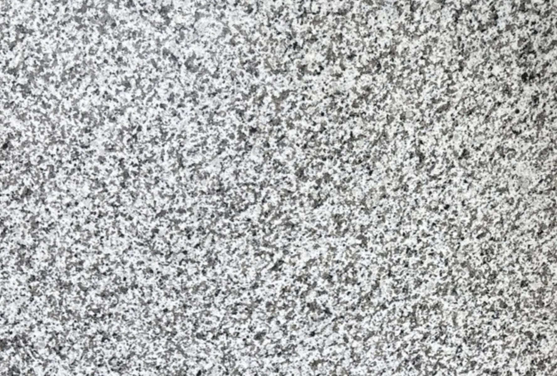 Closeup image of Bianco Antico Grey Granite countertop slab