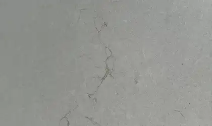 Closeup image of Daltile Mokara White Quartz countertop slab
