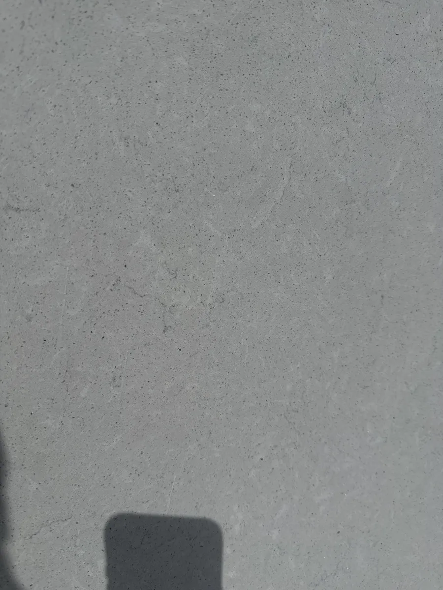 Closeup image of ONE Quartz Surfaces Coronado White White Quartz countertop slab