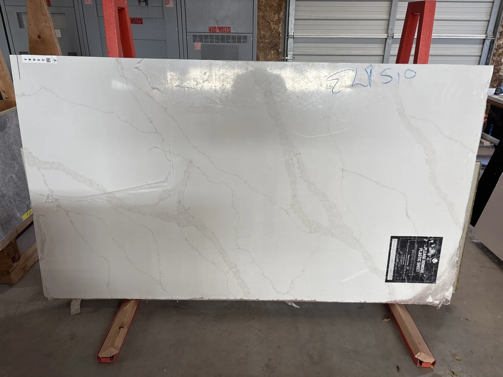 Full image of Q Quartz Calacatta Elysio White Quartz countertop slab