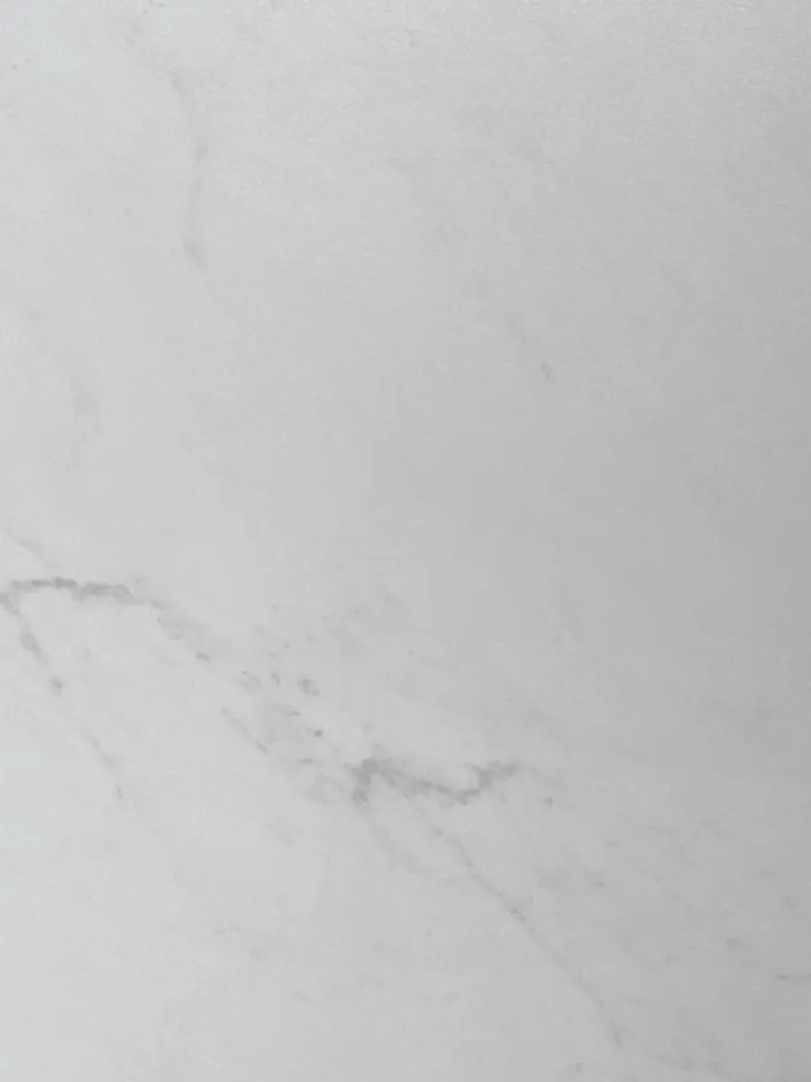 Closeup image of Dekton Marina White Quartz countertop slab