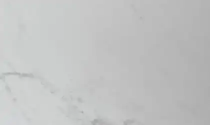 Closeup image of Dekton Marina White Quartz countertop slab