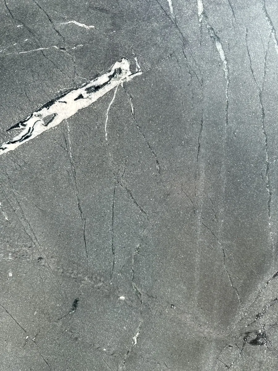 Closeup image of Black Diamond Quartzite countertop slab