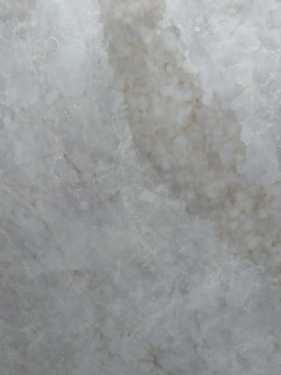 Closeup image of Viatera Taj Duna Cream Quartz countertop slab