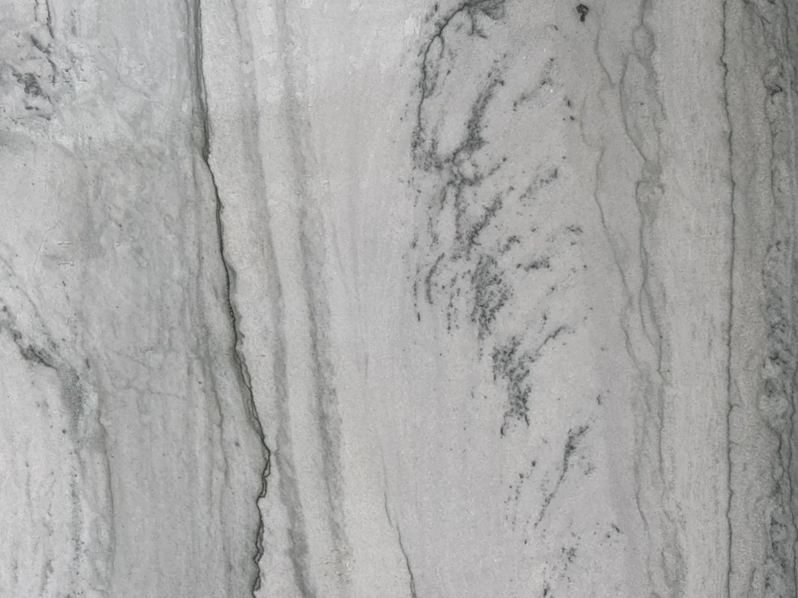 Closeup image of Statuario Quartzite countertop slab