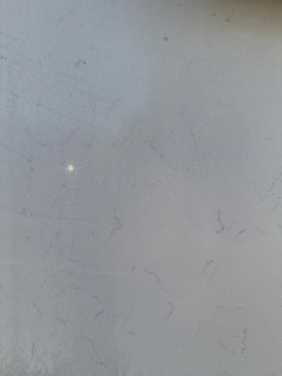 Closeup image of Stratus Quartz Classic Carrara White Quartz countertop slab