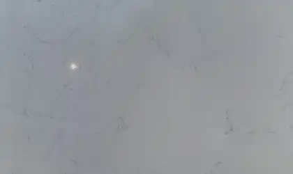 Closeup image of Stratus Quartz Classic Carrara White Quartz countertop slab