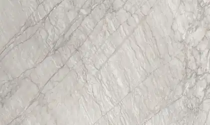 Closeup image of Apollo Venato Cream Quartzite countertop slab