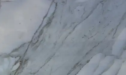 Closeup image of Calacatta Gold Marble countertop slab