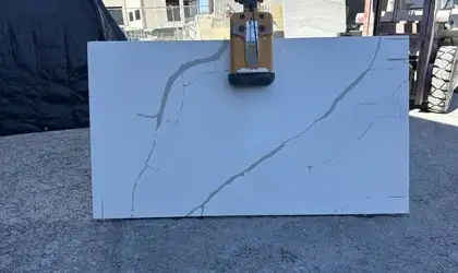 Full image of Q Quartz Calacatta Laza Quartz countertop slab
