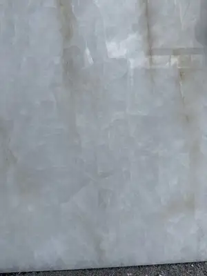 Closeup image of Crystallo Lumix White Quartzite countertop slab