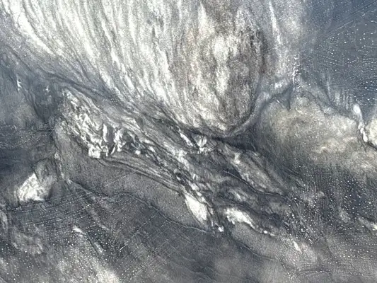 Closeup image of Black Fantasy Quartzite countertop slab