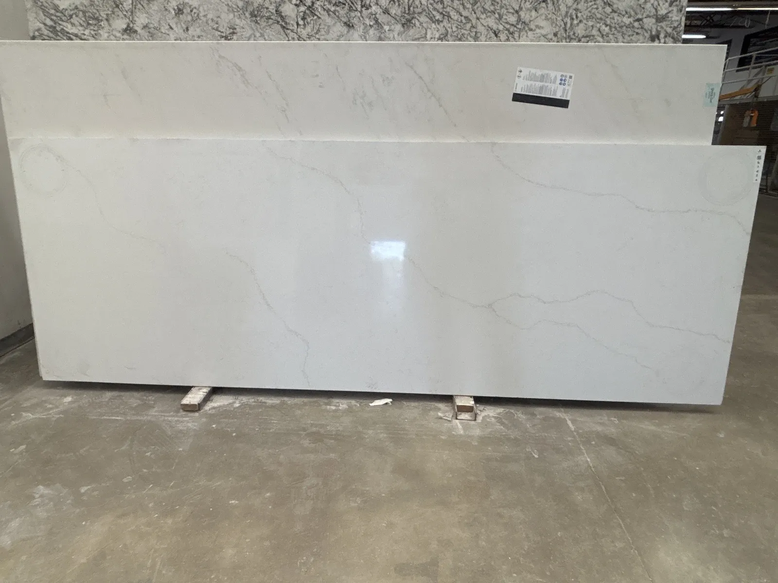 Full image of Q Quartz Calacatta Rusta White Quartz countertop slab