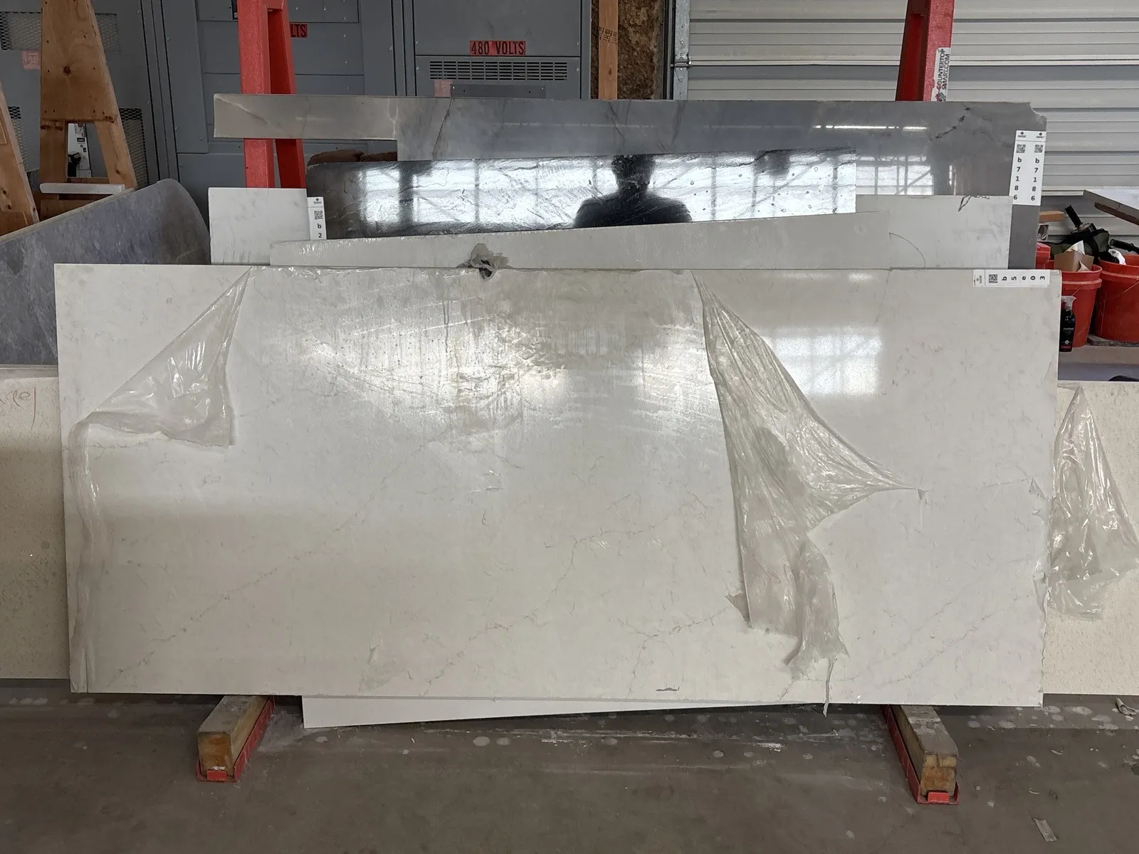 Full image of Q Quartz Calacatta Karmelo Quartz countertop slab