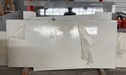 Full image of Q Quartz Calacatta Karmelo Quartz countertop slab