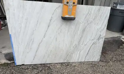 Closeup image of White Pearl Quartzite countertop slab