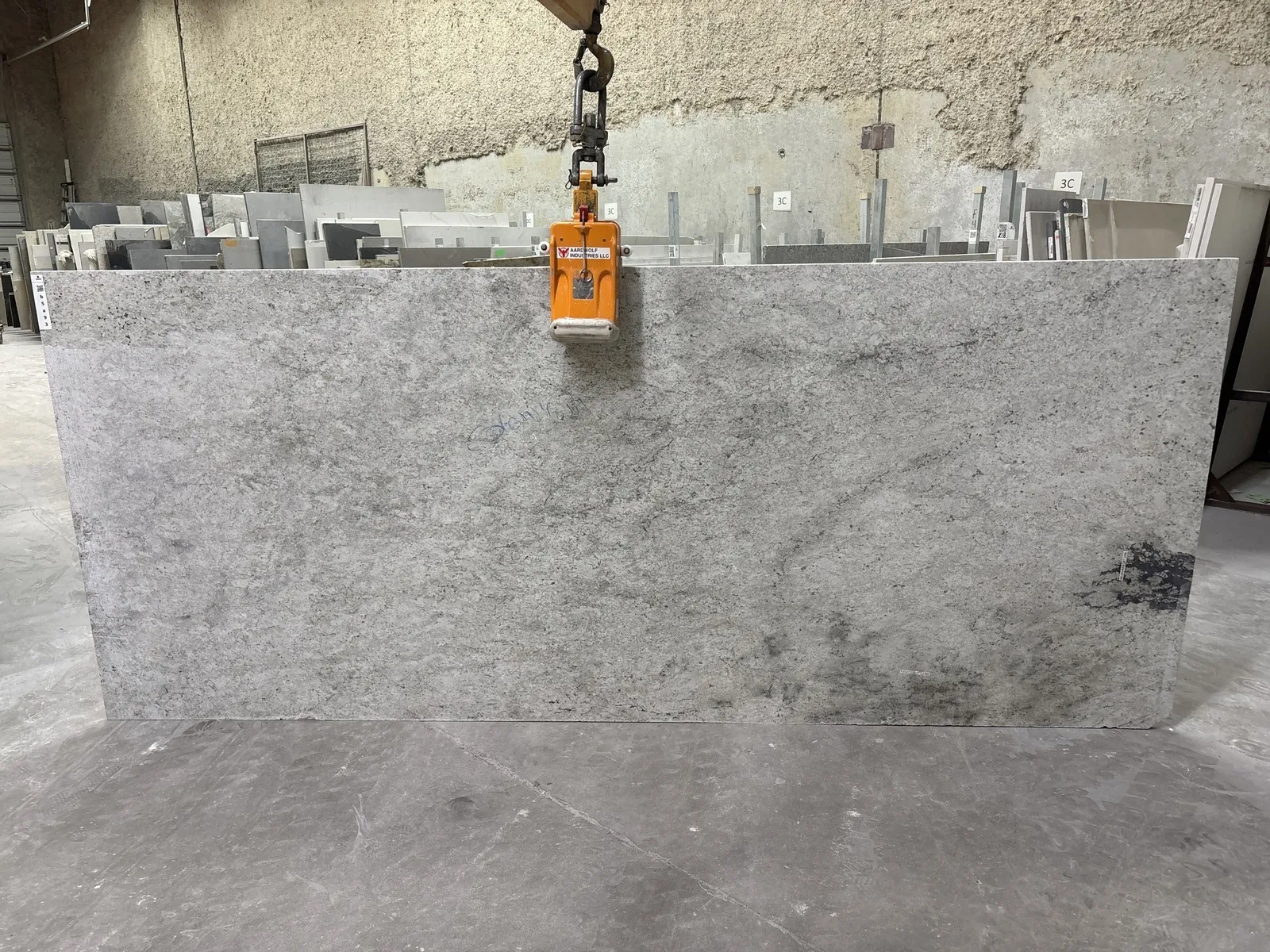 Full image of Colonial White Grey Granite countertop slab