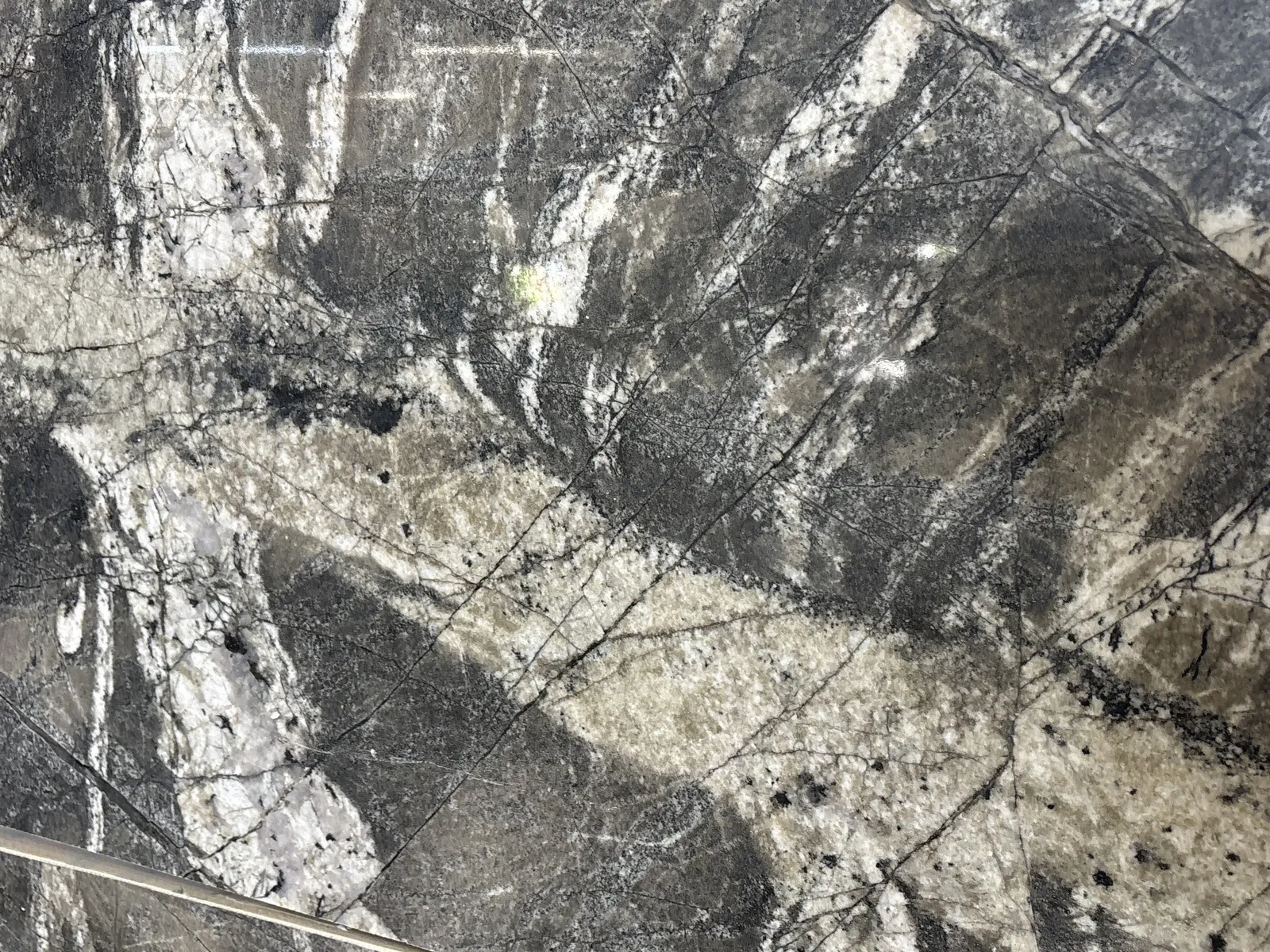 Closeup image of Prague Black Quartzite countertop slab