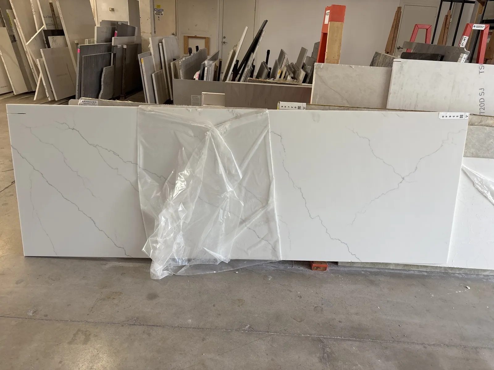 Full image of Q Quartz Calacatta Miraggio Quartz countertop slab