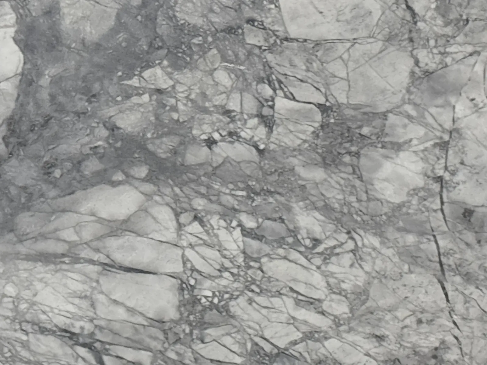 Closeup image of Grey Goose Marble countertop slab
