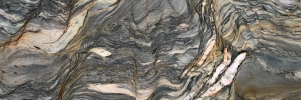 Closeup image of Obsolete Remnants Marble countertop slab